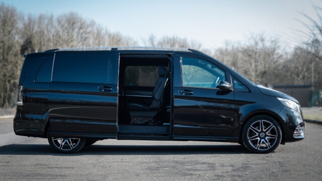 Side shot of a Mercedes V-class with the sliding passenger door open