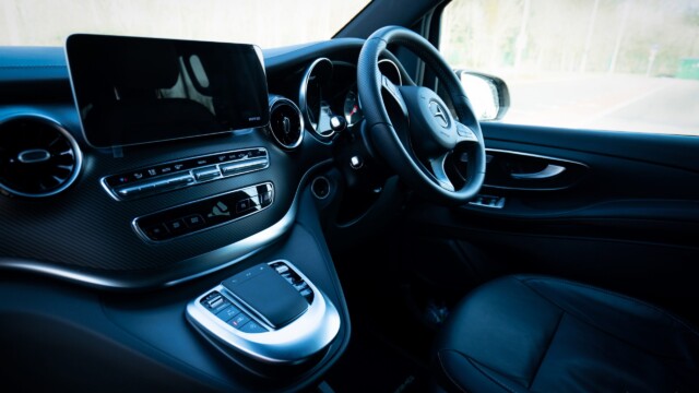 Close up of a Mercedes dashboard and steering wheel